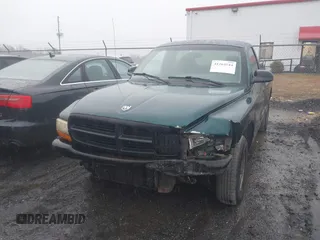 1999 Dodge Dakota SLT with VIN 1B7FL26XXXS209424, listed as a IAAI auction lot 41264544 with 70,523 mi miles. Bid and sale history available at carsss.com. Image 16.