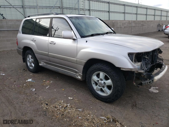 2001 Toyota Land Cruiser with VIN JTEHT05J912005517, listed as a Copart auction lot 50911195 with 273,929 mi miles and Salvage Title. Bid and sale history available at carsss.com. Image 4.