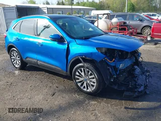 2020 Ford Escape Titanium Hybrid z VIN 1FMCU9DZ1LUB59214, wystawiony jako IAAI lot #42050336 z przebiegiem 59 547 mil mil oraz . Historia ofert i sprzedaży dostępna na DreamBid. Obrazek 1.