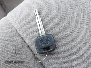 2000 Toyota Camry CE z VIN 4T1BG22K5YU972322, wystawiony jako IAAI lot #42098429 z przebiegiem 122 351 mil mil oraz . Historia ofert i sprzedaży dostępna na DreamBid. Obrazek 11.