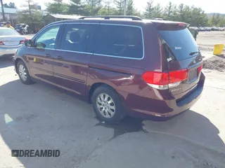 2009 Honda Odyssey EX-L with VIN 5FNRL38619B040594, listed as a IAAI auction lot 42037189 with 189,677 mi miles. Bid and sale history available at carsss.com. Image 3.