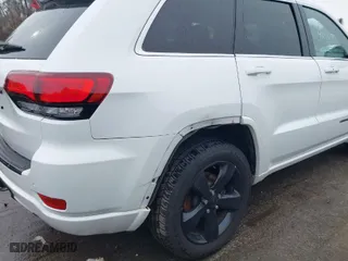 2015 Jeep Grand Cherokee Altitude with VIN 1C4RJFAG7FC954853, listed as a IAAI auction lot 40988796 with 107,002 mi miles. Bid and sale history available at carsss.com. Image 6.