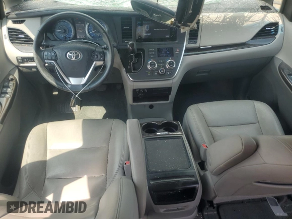 2015 Toyota Sienna XLE with VIN 5TDYK3DC6FS576670, listed as a Copart auction lot 62612345 with 106,475 mi miles and Salvage title. Bid and sale history available at DreamBid. Image 8.