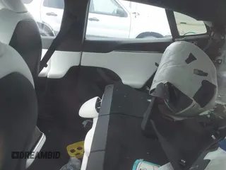 2021 Tesla Model S Plaid z VIN 5YJSA1E64MF452744, wystawiony jako IAAI lot #41375136 z przebiegiem Nie podano mil oraz . Historia ofert i sprzedaży dostępna na DreamBid. Obrazek 8.