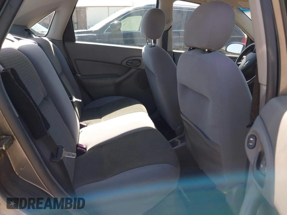 2004 Ford Focus SE with VIN 1FAFP34394W152606, listed as a IAAI auction lot 41833454 with 287,290 mi miles and . Bid and sale history available at DreamBid. Image 8.
