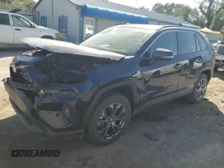 2023 Toyota RAV4 Hybrid XLE Premium z VIN JTMB6RFV5PD090683, wystawiony jako Copart lot #74329494 z przebiegiem 15 739 mil mil oraz Szkoda całkowita • Salvage title. Historia ofert i sprzedaży dostępna na DreamBid. Obrazek 1.