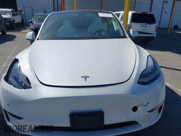 2020 Tesla Model Y Long Range with VIN 5YJYGDEE2LF044811, listed as a IAAI auction lot 41839136 with 68,445 mi miles and . Bid and sale history available at DreamBid. Image 12.