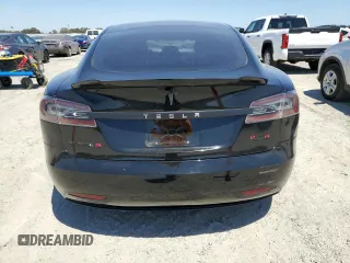 2017 Tesla Model S 60 с VIN 5YJSA1E15HF219286, выставлен на аукционе Copart как лот 66682705 с пробегом 44 923 миль миль и Списание • Salvage title. История ставок и продаж доступна на DreamBid. Изображение 6.