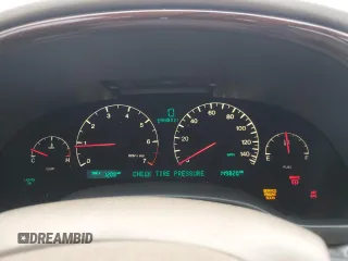 2004 Cadillac DeVille DTS z VIN 1G6KF57944U117834, wystawiony jako Copart lot #89320975 z przebiegiem 149 820 mil mil oraz Szkody całkowita. Historia ofert i sprzedaży dostępna na DreamBid. Obrazek 9.