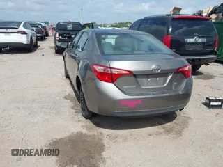 2018 Toyota Corolla L z VIN 5YFBURHE1JP855556, wystawiony jako IAAI lot #42273685 z przebiegiem 165 792 mil mil oraz . Historia ofert i sprzedaży dostępna na DreamBid. Obrazek 3.