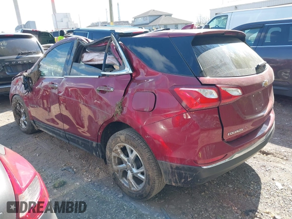 2021 Chevrolet Equinox Premier z VIN 2GNAXNEV7M6140889, wystawiony jako IAAI lot #42039443 z przebiegiem 101 767 mil mil oraz . Historia ofert i sprzedaży dostępna na DreamBid. Obrazek 3.