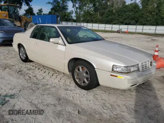 2001 Cadillac Eldorado Touring ETC z VIN 1G6ET12931B103758, wystawiony jako Copart lot #73787764 z przebiegiem Nie podano mil oraz Szkody całkowita. Historia ofert i sprzedaży dostępna na DreamBid. Obrazek 4.