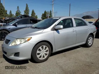2010 Toyota Corolla with VIN 1NXBU4EE4AZ184096, listed as a Copart auction lot 60893235 with 157,700 mi miles and Salvage title. Bid and sale history available at DreamBid. Image 1.