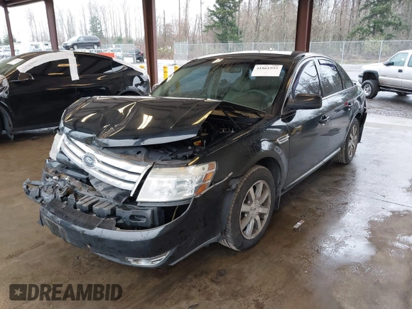 2008 Ford Taurus SEL z VIN 1FAHP24W98G169922, wystawiony jako IAAI lot #41861932 z przebiegiem 126 482 mil mil oraz . Historia ofert i sprzedaży dostępna na DreamBid. Obrazek 2.