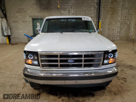 1995 Ford F-150 with VIN 1FTEF14N0SNB49515, listed as a Copart auction lot 50218605 with 113,242 mi miles and Salvage Title. Bid and sale history available at carsss.com. Image 5.