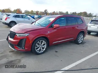 2020 Cadillac XT6 AWD Sport z VIN 1GYKPHRS1LZ201472, wystawiony jako IAAI lot #40610438 z przebiegiem 71 540 mil mil oraz . Historia ofert i sprzedaży dostępna na DreamBid. Obrazek 2.