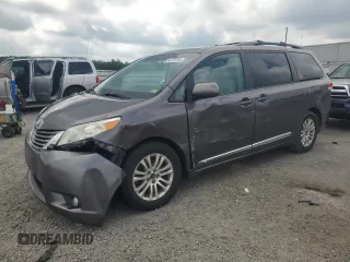 2013 Toyota Sienna XLE AAS with VIN 5TDYK3DC2DS382750, listed as a Copart auction lot 64170765 with 143,201 mi miles and Clean title. Bid and sale history available at DreamBid. Image 1.