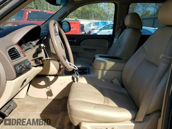 2013 Chevrolet Suburban with VIN 1GNWKMEG8DR213398, listed as a Copart auction lot 75192044 with 160,035 mi miles and Salvage title. Bid and sale history available at DreamBid. Image 7.