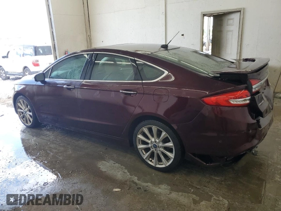 2017 Ford Fusion Titanium with VIN 3FA6P0K9XHR174578, listed as a Copart auction lot 57999305 with 77,657 mi miles and Salvage title. Bid and sale history available at DreamBid. Image 2.