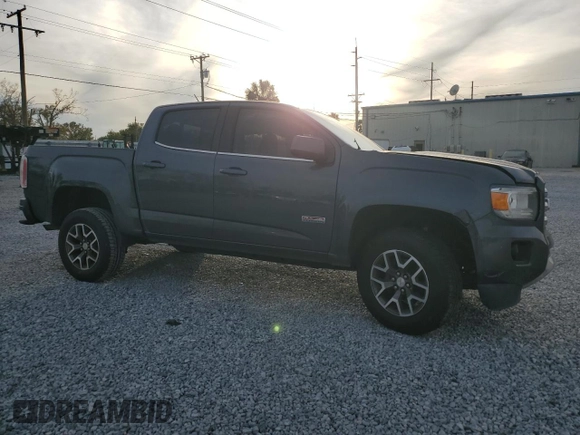 2016 GMC Canyon 4WD SLE with VIN 1GTG6CE35G1370091, listed as a Copart auction lot 87124814 with 130,583 mi miles and Salvage Title. Bid and sale history available at carsss.com. Image 4.