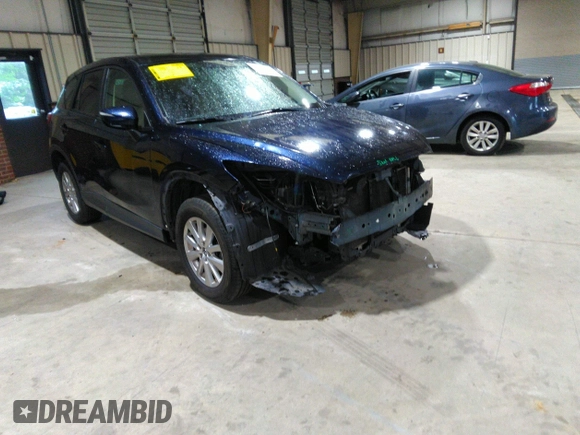 2016 Mazda CX-5 Sport with VIN JM3KE2BY5G0782385, listed as a IAAI auction lot 41971163 with 87,251 mi miles. Bid and sale history available at carsss.com. Image 1.