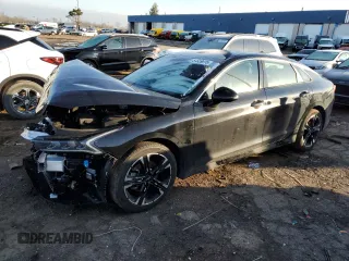 2024 Kia K5 GT-Line z VIN 5XXG64J21RG251951, wystawiony jako Copart lot #51559015 z przebiegiem 21 497 mil mil oraz Nie do naprawy • Non repairable. Historia ofert i sprzedaży dostępna na DreamBid. Obrazek 1.