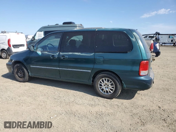 2002 Kia Sedona LX with VIN KNDUP131026325853, listed as a Copart auction lot 65872234 with 114,798 mi miles and Clean Title. Bid and sale history available at carsss.com. Image 2.