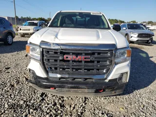2021 GMC Canyon 4WD AT4 w/Cloth with VIN 1GTG6FEN9M1216062, listed as a Copart auction lot 80932634 with 73,308 mi miles and Salvage Title. Bid and sale history available at carsss.com. Image 5.