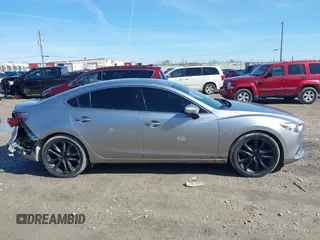 2015 Mazda 6 i Grand Touring with VIN JM1GJ1W68F1170459, listed as a IAAI auction lot 41759915 with 109,911 mi miles and . Bid and sale history available at DreamBid. Image 14.