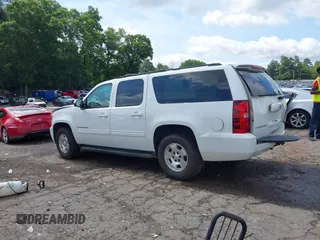 2014 Chevrolet Suburban LT with VIN 1GNSCJE07ER211222, listed as a IAAI auction lot 42428084 with 214,712 mi miles and . Bid and sale history available at DreamBid. Image 14.