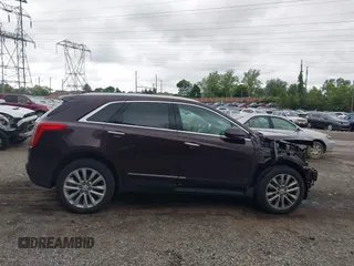2017 Cadillac XT5 Platinum AWD z VIN 1GYKNFRS2HZ224860, wystawiony jako IAAI lot #42272142 z przebiegiem 95 697 mil mil oraz . Historia ofert i sprzedaży dostępna na DreamBid. Obrazek 13.