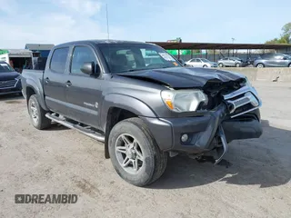 2014 Toyota Tacoma PreRunner with VIN 3TMJU4GN1EM156845, listed as a IAAI auction lot 40972570 with 65,138 mi miles. Bid and sale history available at carsss.com. Image 1.