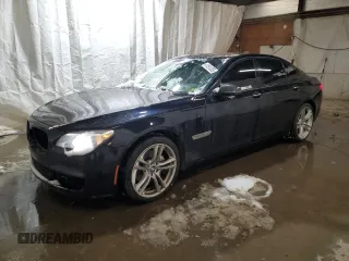 2013 BMW 7 Series 740i with VIN WBAYA6C5XDC995236, listed as a Copart auction lot 41581205 with 121,388 mi miles and Salvage Title. Bid and sale history available at carsss.com. Image 1.
