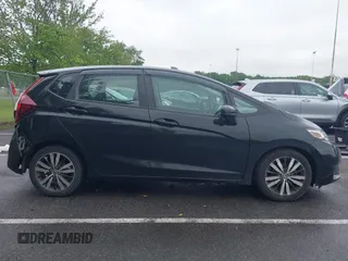 2015 Honda Fit EX-L z VIN 3HGGK5H81FM778816, wystawiony jako IAAI lot #42376942 z przebiegiem 155 374 mil mil oraz . Historia ofert i sprzedaży dostępna na DreamBid. Obrazek 13.