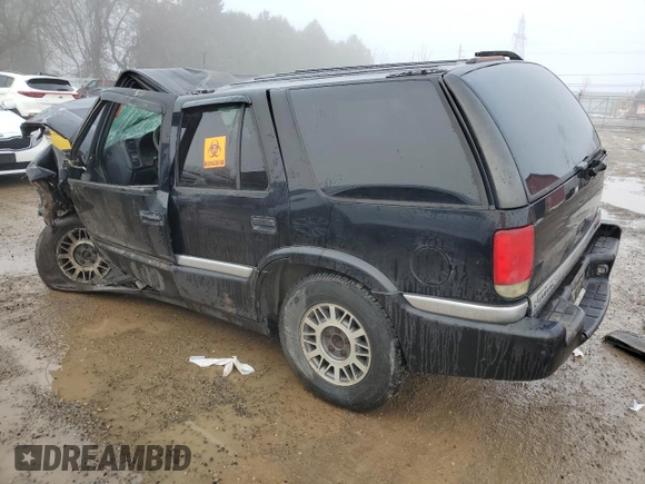 1999 GMC Jimmy SLE with VIN 1GKDT13W3X2522381, listed as a Copart auction lot 83219014 with Not Provided miles and Non Repairable. Bid and sale history available at carsss.com. Image 2.