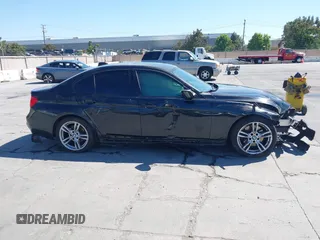 2014 BMW 3 Series 328i with VIN WBA3C1C54EK112620, listed as a IAAI auction lot 42712414 with 169,297 mi miles and . Bid and sale history available at DreamBid. Image 14.