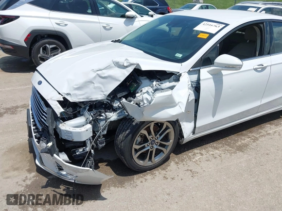 2020 Ford Fusion SEL with VIN 3FA6P0CD3LR152711, listed as a IAAI auction lot 42516763 with 97,073 mi miles and . Bid and sale history available at DreamBid. Image 6.