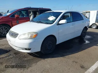 2004 Toyota Corolla CE with VIN JTDBR32E540051928, listed as a IAAI auction lot 41958483 with 299,999 mi miles. Bid and sale history available at carsss.com. Image 18.