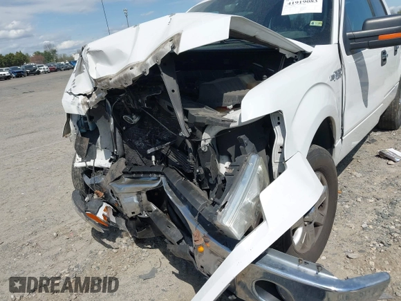 2013 Ford F-150 XL with VIN 1FTFW1EF7DKD34810, listed as a IAAI auction lot 41919083 with 158,531 mi miles. Bid and sale history available at carsss.com. Image 6.