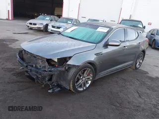 2013 Kia Optima SX with VIN 5XXGR4A6XDG151415, listed as a IAAI auction lot 41881054 with 253,877 mi miles. Bid and sale history available at carsss.com. Image 2.