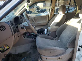 2001 Isuzu Rodeo S with VIN 4S2CK58W414338481, listed as a Copart auction lot 80849314 with 109,036 mi miles and Salvage Title. Bid and sale history available at DreamBid. Image 7.