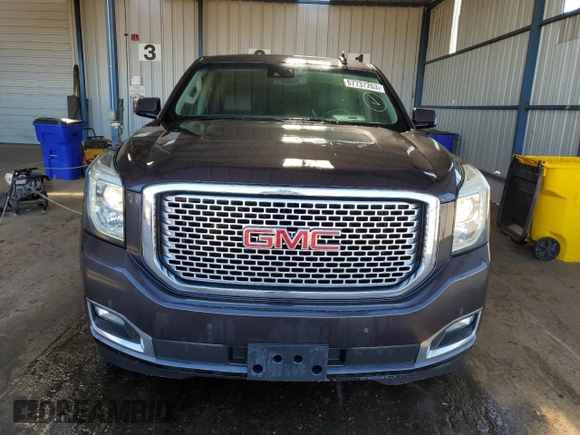 2015 GMC Yukon XL Denali with VIN 1GKS2JKJ1FR615647, listed as a Copart auction lot 67737263 with 183,728 mi miles and Salvage Title. Bid and sale history available at carsss.com. Image 5.
