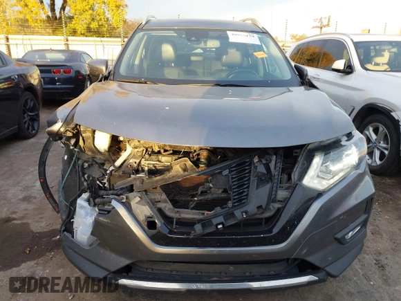 2017 Nissan Rogue SL z VIN 5N1AT2MT8HC867339, wystawiony jako IAAI lot #40955179 z przebiegiem 138 769 mil mil oraz . Historia ofert i sprzedaży dostępna na DreamBid. Obrazek 12.