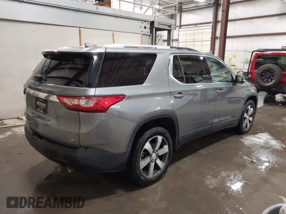 2018 Chevrolet Traverse LT Leather with VIN 1GNEVHKW2JJ220525, listed as a IAAI auction lot 41570668 with 147,721 mi miles. Bid and sale history available at carsss.com. Image 4.