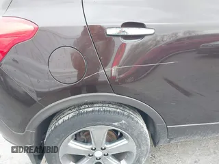 2013 Buick Encore Leather with VIN KL4CJCSB0DB144646, listed as a IAAI auction lot 41668384 with 122,082 mi miles and . Bid and sale history available at carsss.com. Image 12.