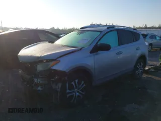 2017 Toyota RAV4 LE with VIN 2T3BFREV1HW607984, listed as a IAAI auction lot 41878970 with 136,941 mi miles and . Bid and sale history available at DreamBid. Image 2.