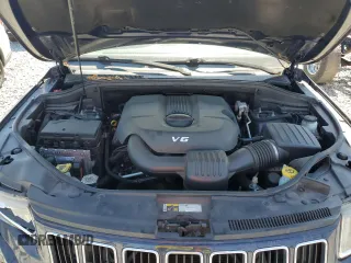 2015 Jeep Grand Cherokee Altitude with VIN 1C4RJEAG8FC668388, listed as a Copart auction lot 52360135 with 181,402 mi miles and Salvage Title. Bid and sale history available at carsss.com. Image 12.