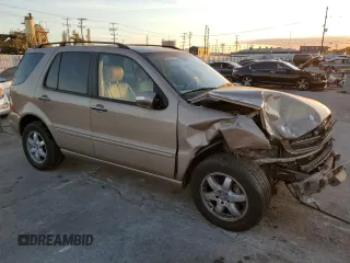 2004 Mercedes-Benz M-Class with VIN 4JGAB75E34A489128, listed as a Copart auction lot 84498404 with 122,094 mi miles and Salvage Title. Bid and sale history available at carsss.com. Image 4.