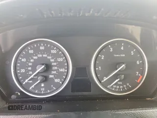 2012 BMW X5 35i с VIN 5UXZV4C52CL988794, выставлен на аукционе Copart как лот 61688485 с пробегом Не указан миль и Чистый • Clean title. История ставок и продаж доступна на DreamBid. Изображение 9.