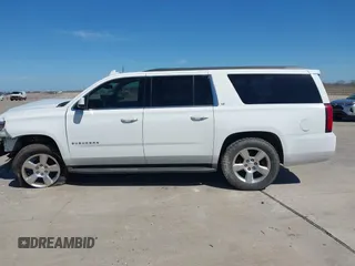 2016 Chevrolet Suburban LT z VIN 1GNSKHKC7GR172516, wystawiony jako IAAI lot #41680550 z przebiegiem 237 270 mil mil oraz . Historia ofert i sprzedaży dostępna na DreamBid. Obrazek 13.
